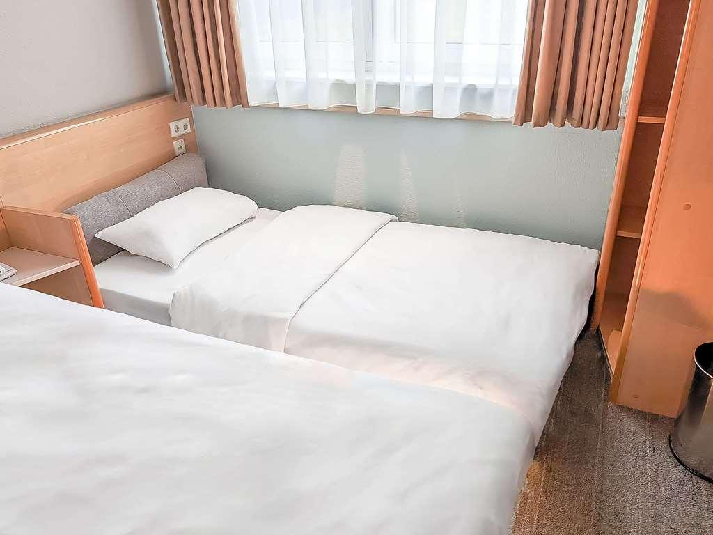 Ibis Luebeck City Hotell Rom bilde